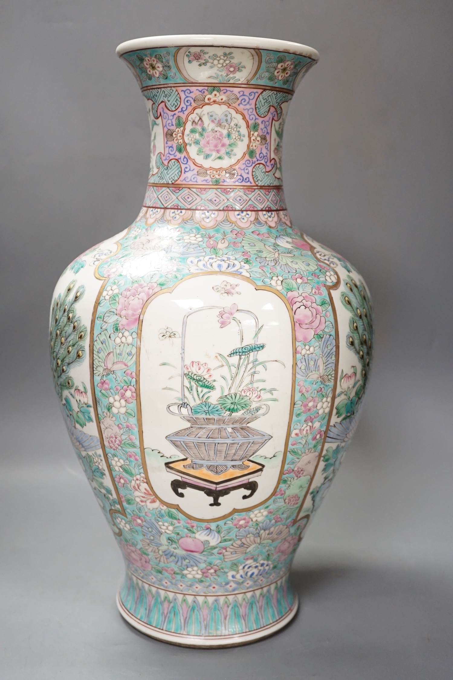 A Japanese famille rose ‘peacock’ vase circa 1900. 45cm